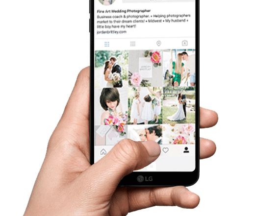 Hand holding an LG smartphone displaying an Instagram profile with photos of weddings and floral arrangements.
