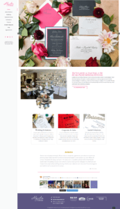A flat lay featuring wedding invitation cards, envelopes, and floral decorations on a cream background.