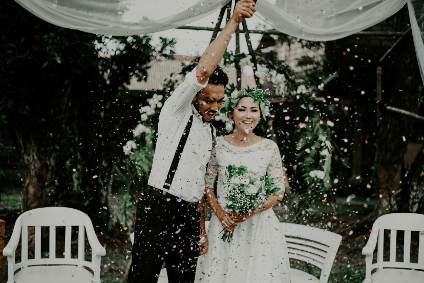 couple celebrating at their wedding reception
